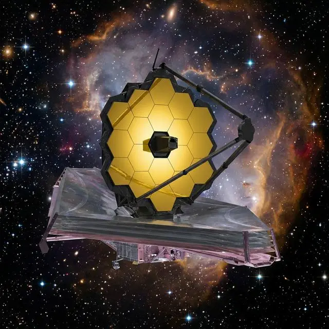 Telescopio Espacial James Webb flotando en el espacio profundo con sus espejos hexagonales dorados reflejando estrellas y nebulosas — el instrumento que detectó bioseñales en exoplanetas